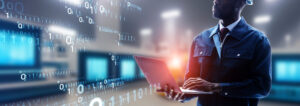 Engineer inspecting factory and digital data concept. Wide image