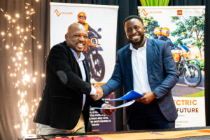 1. Official document handover by Bernard Mwonyonyo and Habib Lukaya